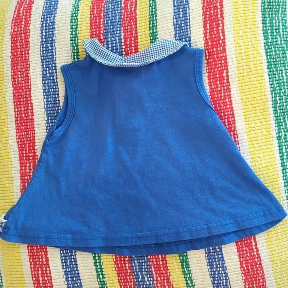Vintage blue dress with embroidered butterfly and‎ gingham ruffle details